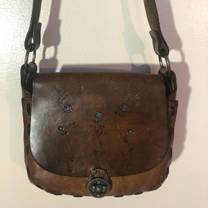 Authentic leather saddle bag